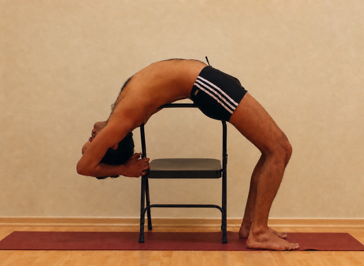 Chair-Supported Backbend yoga practice demonstrated by Pankaj